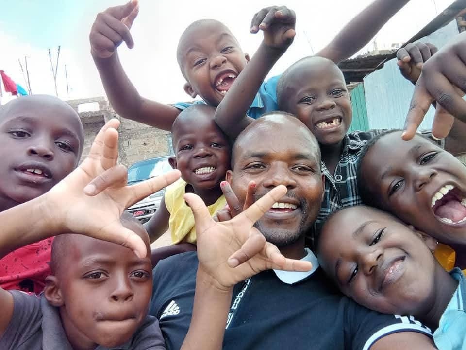 DK Foundation — Danny Kioko with children in Kenya